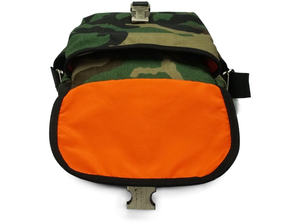 Mini Messenger Bag with leather trim and a lifetime warranty. Tucker